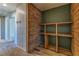 Hallway nook with custom shelving, wood accent wall, and modern design at 7900 Dutch Canyon Ct, Las Vegas, NV 89131