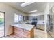 Modern kitchen featuring stainless steel appliances, an island, and stylish countertops at 7900 Dutch Canyon Ct, Las Vegas, NV 89131
