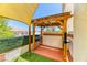 Backyard patio shaded by a pergola, offering outdoor living space at 7900 Dutch Canyon Ct, Las Vegas, NV 89131