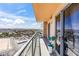 Relax on this covered balcony with views of the city and mountains in the distance at 8255 Las Vegas Blvd # 1219, Las Vegas, NV 89123