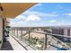Enjoy city views from this covered balcony with steel railings and palm trees at 8255 Las Vegas Blvd # 1219, Las Vegas, NV 89123