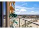 Relax on this covered balcony with views of the city and mountains in the distance at 8255 Las Vegas Blvd # 1219, Las Vegas, NV 89123
