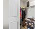 Organized closet space with hanging racks and shelves for efficient clothing and accessory storage at 8255 Las Vegas Blvd # 1219, Las Vegas, NV 89123