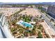 Aerial shot of the sparkling pool and lush landscaping surrounding this beautiful property at 8255 Las Vegas Blvd # 1219, Las Vegas, NV 89123