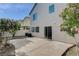 Backyard with mature landscaping and concrete patio at 8307 Fort Hallock Ave, Las Vegas, NV 89131