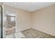 Comfortable bedroom featuring carpeted floors with an open doorway and natural light at 8307 Fort Hallock Ave, Las Vegas, NV 89131