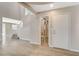 Bright entryway with wood-look floors and a staircase leading to the second level at 8307 Fort Hallock Ave, Las Vegas, NV 89131