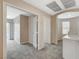 Cozy loft area has carpet, neutral walls, and access to bedrooms and a hallway at 8307 Fort Hallock Ave, Las Vegas, NV 89131