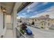 Exterior view of townhomes with well-kept landscaping and front-facing garages at 8307 Fort Hallock Ave, Las Vegas, NV 89131