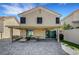 Rear exterior view of home highlighting covered patio and outdoor living space at 8316 Maplestar Rd, Las Vegas, NV 89128