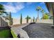 Spacious backyard featuring a paved patio and a well-maintained perimeter wall at 8316 Maplestar Rd, Las Vegas, NV 89128