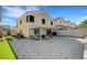 The backyard boasts a spacious patio, offering ample space for outdoor entertaining and relaxation at 8316 Maplestar Rd, Las Vegas, NV 89128