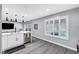 Bright kitchen with stainless steel appliances and white cabinetry offers modern appeal at 8316 Maplestar Rd, Las Vegas, NV 89128