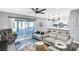 Living room with seamless access to a covered patio and outdoor space for entertaining at 8316 Maplestar Rd, Las Vegas, NV 89128