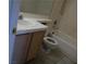 Cozy bathroom featuring a tub, tile flooring and single sink vanity at 8332 Shore Breeze Dr, Las Vegas, NV 89128
