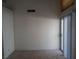 Spacious bedroom features plush carpeting, and sliding glass doors at 8332 Shore Breeze Dr, Las Vegas, NV 89128
