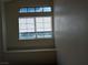 Bedroom with large window and a built in seat and ledge below at 8332 Shore Breeze Dr, Las Vegas, NV 89128