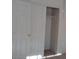 Bedroom with sliding closet doors and neutral color palette at 8332 Shore Breeze Dr, Las Vegas, NV 89128