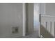 Upstairs hallway featuring plush carpeting with bright light at 8332 Shore Breeze Dr, Las Vegas, NV 89128