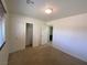 Neutral bedroom featuring a closet, carpet flooring, and ensuite bathroom access at 8566 Bright Bush St, Las Vegas, NV 89131