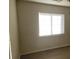 Bright bedroom with large window providing natural light and cozy feel at 8695 Canfield Canyon Ave, Las Vegas, NV 89178
