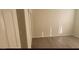 Bedroom with plank flooring, closet, and modern fixtures at 8695 Canfield Canyon Ave, Las Vegas, NV 89178