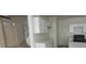 Bright kitchen featuring white cabinets and countertops at 8695 Canfield Canyon Ave, Las Vegas, NV 89178