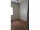 Bright bedroom featuring fresh carpeting, one window, and neutral paint at 8749 Brilliant Star Dr, Las Vegas, NV 89178
