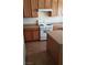 Features an eat-in island, gas stove, and ample oak cabinetry at 8749 Brilliant Star Dr, Las Vegas, NV 89178