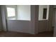 Bright neutral loft area with half wall and open staircase to lower level at 8749 Brilliant Star Dr, Las Vegas, NV 89178