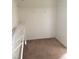 Empty walk-in closet with carpeted floor and shelving at 8749 Brilliant Star Dr, Las Vegas, NV 89178