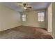 Cozy bedroom with carpet, ceiling fan and natural light at 9120 Parkstone Ave, Las Vegas, NV 89178