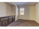 Bedroom featuring carpet and a built-in cabinet at 9120 Parkstone Ave, Las Vegas, NV 89178