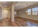 Open dining area with hardwood floors, neutral walls, and easy access to the kitchen at 9120 Parkstone Ave, Las Vegas, NV 89178