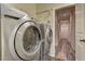 Laundry room with front load washer and dryer at 9120 Parkstone Ave, Las Vegas, NV 89178