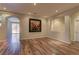Spacious living room featuring hardwood floors, neutral paint, and recessed lighting at 9120 Parkstone Ave, Las Vegas, NV 89178
