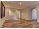 Spacious living room with hardwood floors, recessed lighting and neutral paint at 9120 Parkstone Ave, Las Vegas, NV 89178