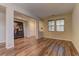 Spacious living room with hardwood floors, neutral walls, and bright natural light at 9120 Parkstone Ave, Las Vegas, NV 89178