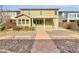 Backyard featuring a large covered patio and low maintenance landscaping at 9609 Rolling Thunder Ave, Las Vegas, NV 89148