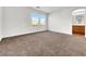 Spacious bedroom featuring soft carpeting and large bright windows with beautiful view at 9609 Rolling Thunder Ave, Las Vegas, NV 89148