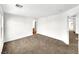 Spacious bedroom featuring neutral carpet and bright, white walls at 9609 Rolling Thunder Ave, Las Vegas, NV 89148