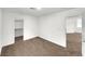 Bedroom boasting neutral walls, carpet flooring, a closet, and a transom window at 9609 Rolling Thunder Ave, Las Vegas, NV 89148