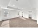 Primary bedroom with neutral walls and carpet flooring, a window, recessed lighting, and a tray ceiling at 9609 Rolling Thunder Ave, Las Vegas, NV 89148