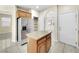 Modern kitchen with stainless steel appliances, center island, and ample cabinet space at 9609 Rolling Thunder Ave, Las Vegas, NV 89148