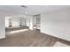 Spacious primary bedroom showcasing carpet, neutral walls, tray ceiling, and recessed lighting at 9609 Rolling Thunder Ave, Las Vegas, NV 89148