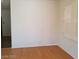 An open area features light interior paint, plank flooring, and plantation shutters at 9937 La Paca Ave, Las Vegas, NV 89117