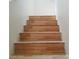 Wooden staircase leads to the upper level in this well-maintained home at 9937 La Paca Ave, Las Vegas, NV 89117