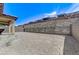 Large backyard surrounded by fencing, offering plenty of space and scenic mountain views in the distance at , Henderson, NV 89011