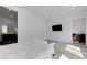 Large bedroom with en-suite bathroom, and light-colored tile flooring at , Henderson, NV 89011