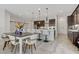 Modern kitchen with stainless steel appliances and a large center island with breakfast bar at , Henderson, NV 89011